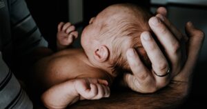 Blog 42 A parent and newborn representing marriage after a baby
